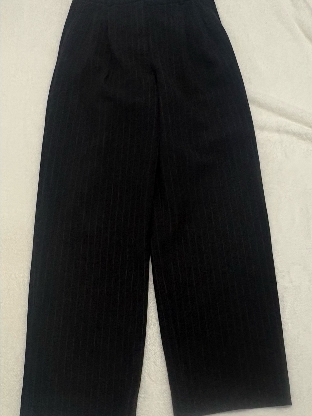 Babaton Black Labeled Garment with White Brand Tag